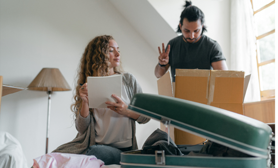 a couple ticking off their checklist before relocating to another country